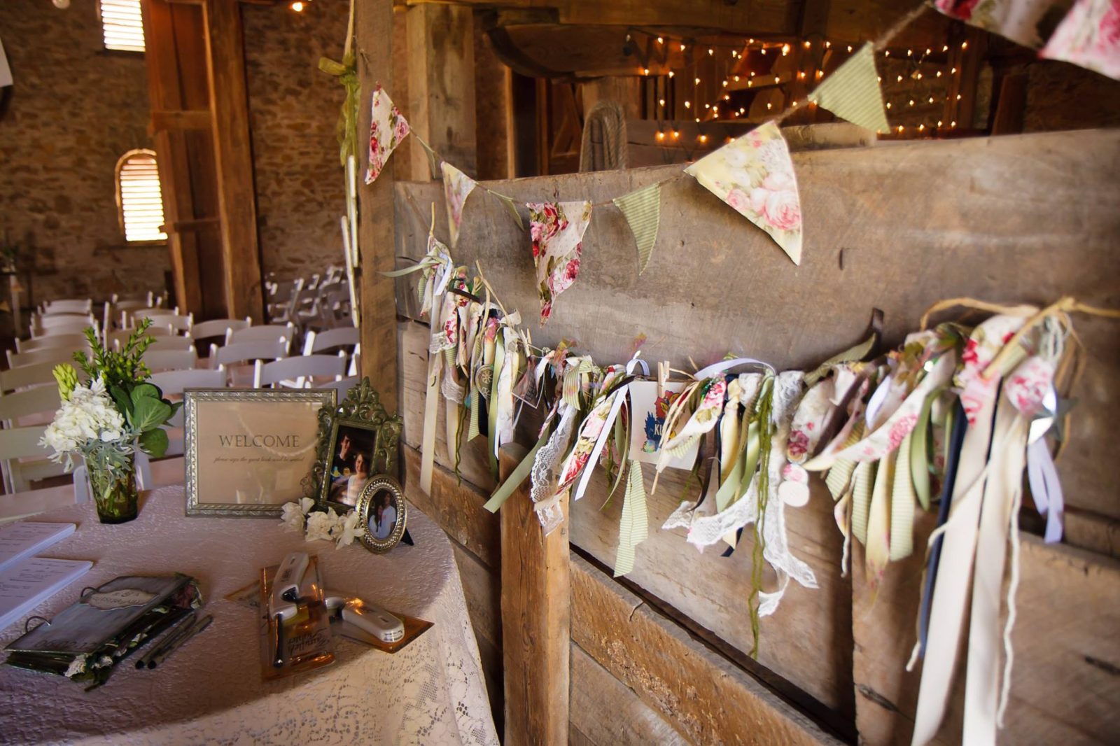 Rustic fabric bunting decorating a wooden wall in a cozy space.